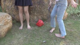 aapary Two Girls Showing Their Bare Feet On The Grass In The Park.jpg