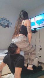 Facesitting in front of the tv for my human chair.jpg